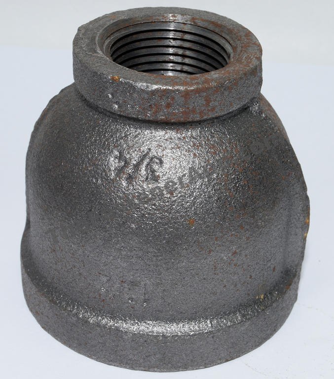 BLACK PIPE FITTING REDUCING COUPLING 1-1/2X1 NPT 150#